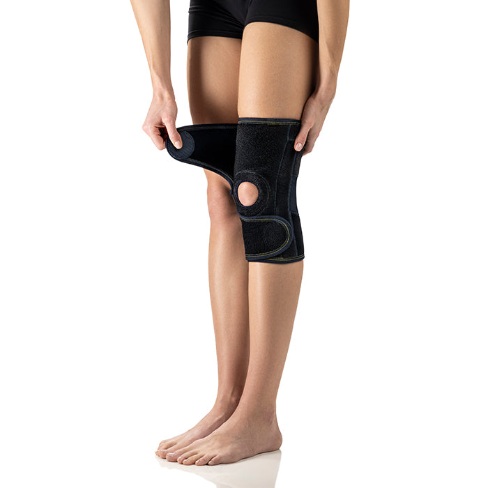 Ginocchiera elastica con foro e aste policentriche